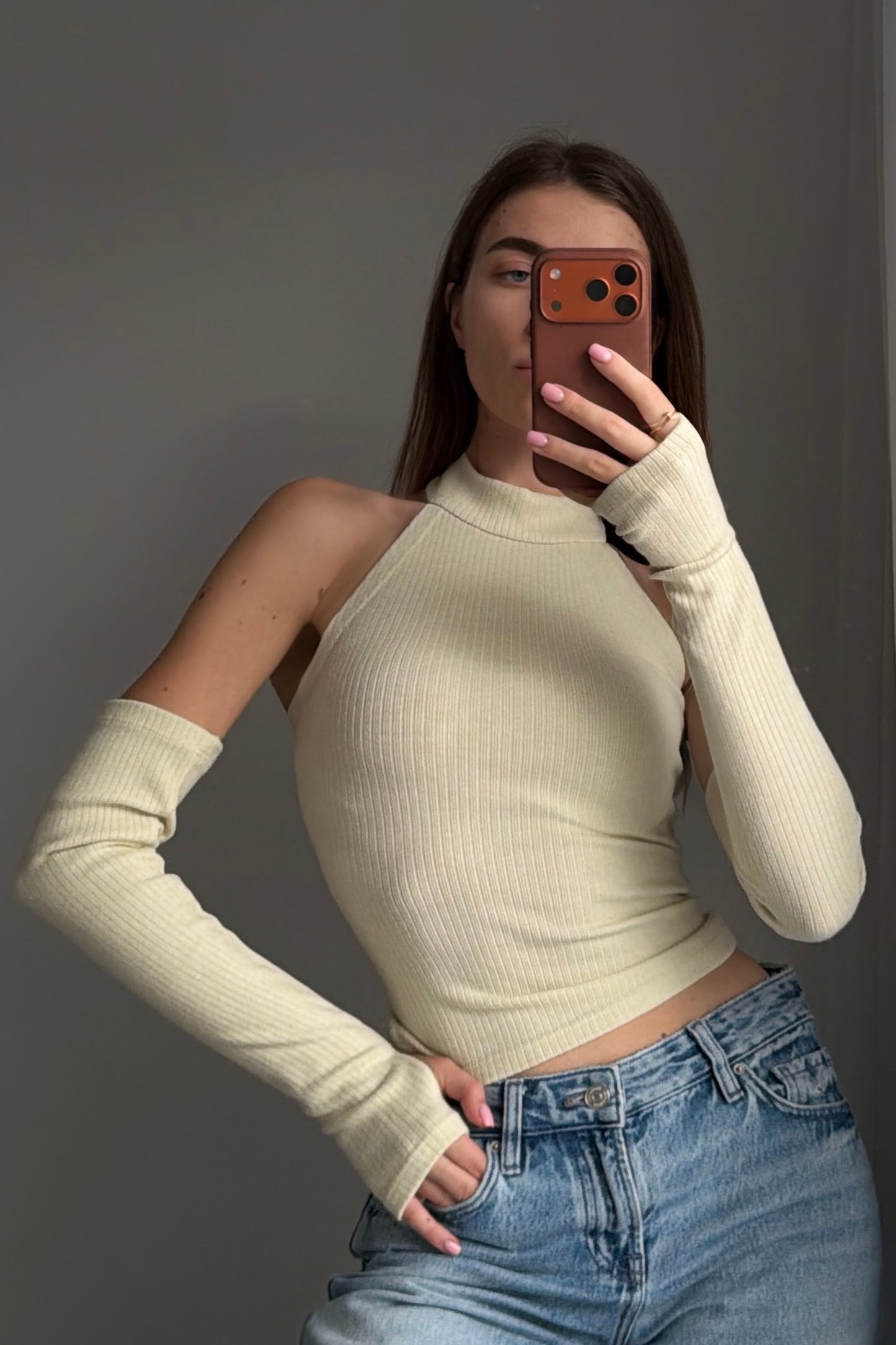 Top with detached sleeves, creamy